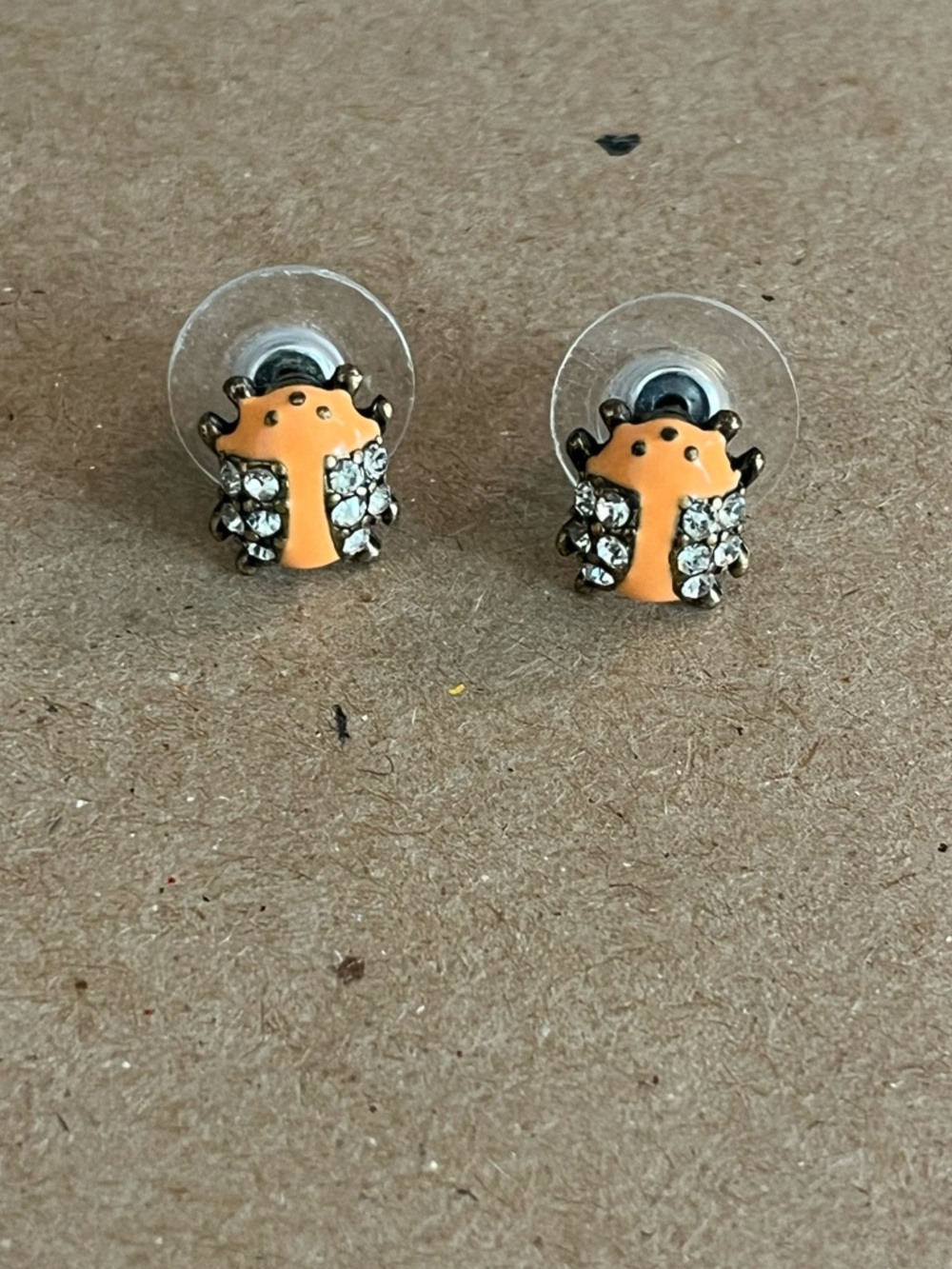 Juicy couture  peach ladybug earrings